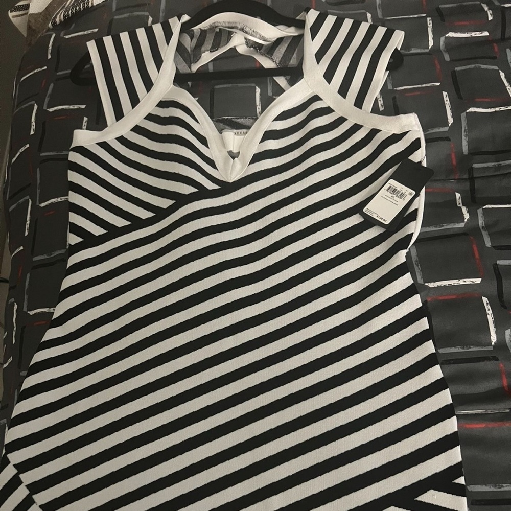 Brand new black and white guess sexy dress. Size X large.
